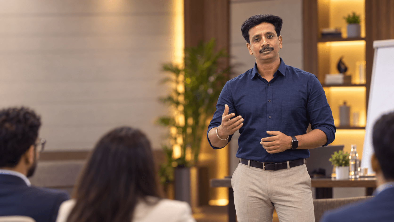 Arjun with a small group — the work is to make the next healthy action small enough to continue.